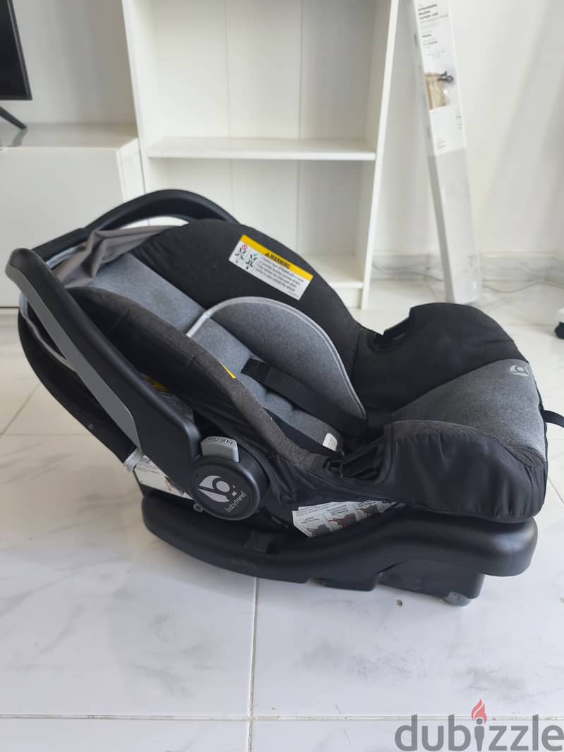 Car Seat for infants and Children with its base, Babytrend Brand. 2