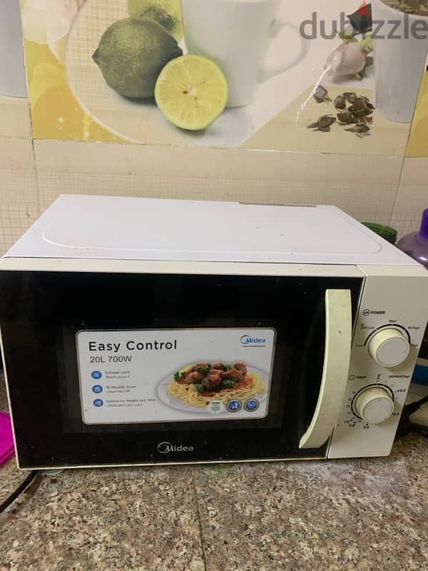 microwave and fridge for urgent sale 0