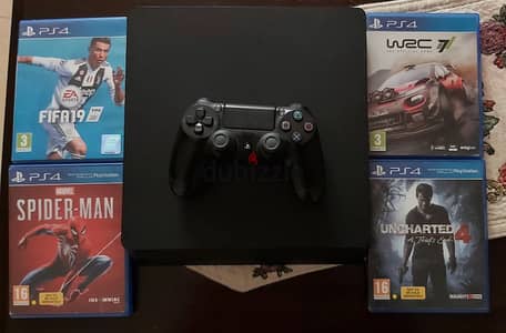 PS4 SLIM WITH 1 JOYSTICK AND 4 GAMES