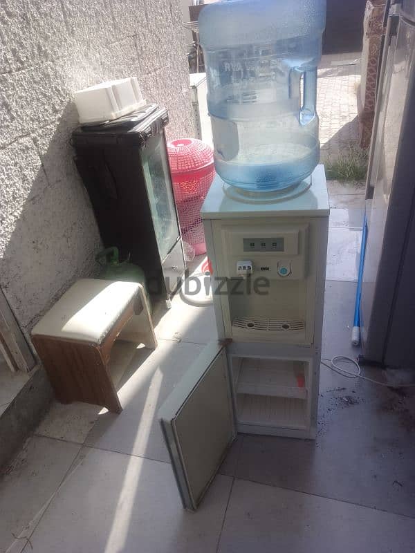 dispenser with cooling cabinet and empty bottle 1