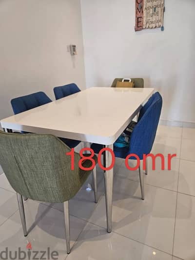 dinning table with 6 soft chairs