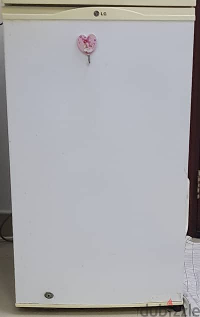 Refrigerator and gas cylinder