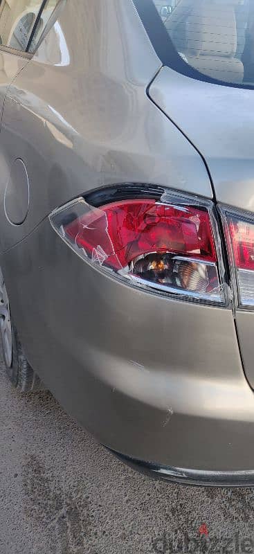 Need Mazda 2 Tail light Set back side