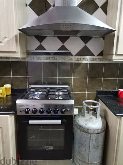 4 eyes Cooker + gas cylinder