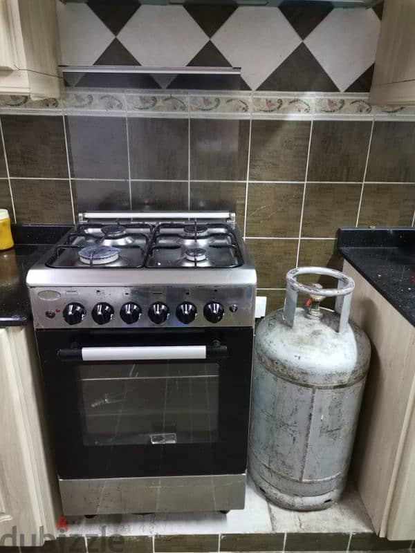 4 eyes Cooker + gas cylinder 1