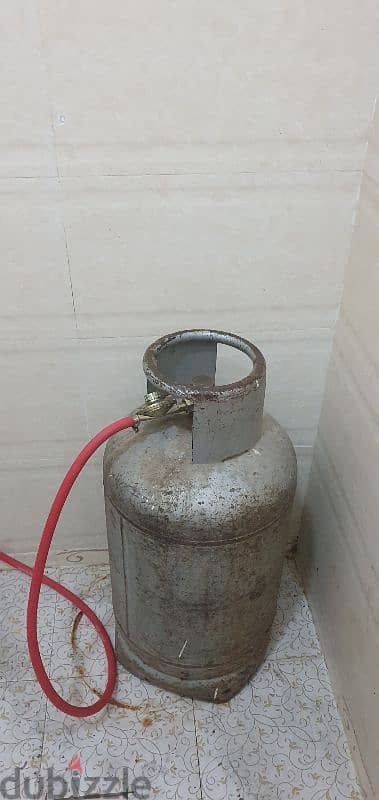 gas cylinder with stove and hose pipe