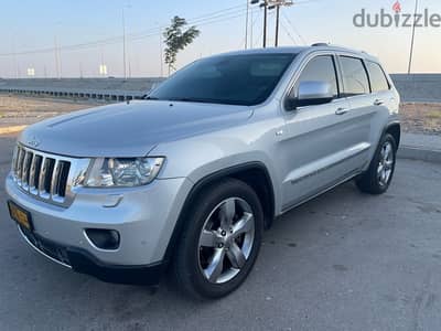 سعر منخفض  ععاجل - جيب  جراند شيروكي 5.7L overland  وكالة عمان  2012 -