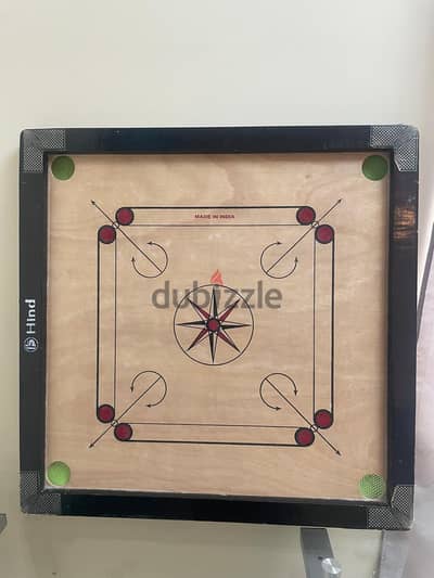 Carrom board with coins