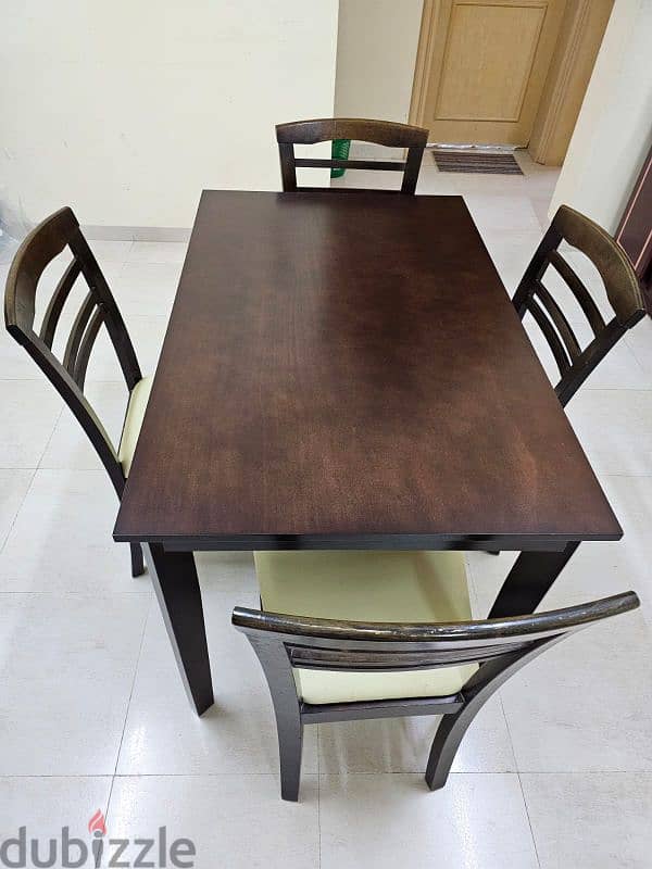 used dining table with 4 chairs 0