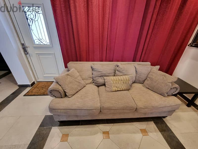 Grey three seater + two seater sofa + rug + center table 1