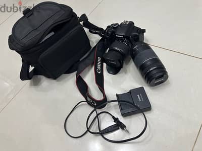 Canon 600D DSRL camera with two lenses