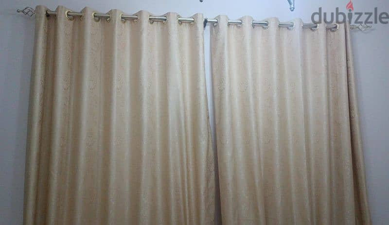 Curtain with brackets and rods 1