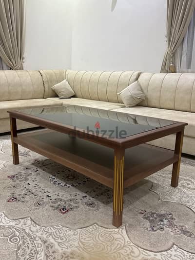 Wooden table with tinted glass