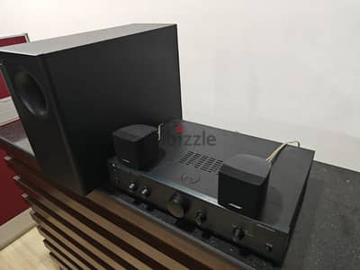 Bose stereo system along with Cambridge audio integrated amplifier