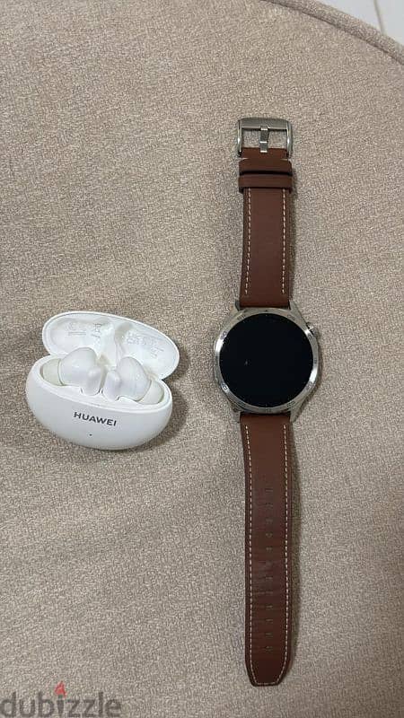 Huawei Watch GT 5  + Headphones Huawei. 1