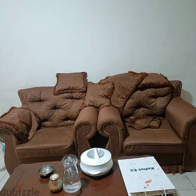 2 single sofas with table