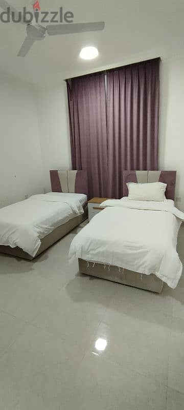 Single beds for rentمساحة سرير فردي، غرف وشقق مفروشة بالكامل للإيجار 17