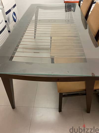 Dining table with glass top - OMR 25