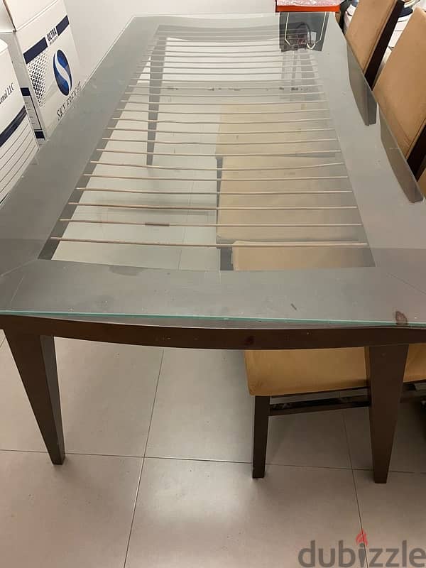 Dining table with glass top - OMR 25 0