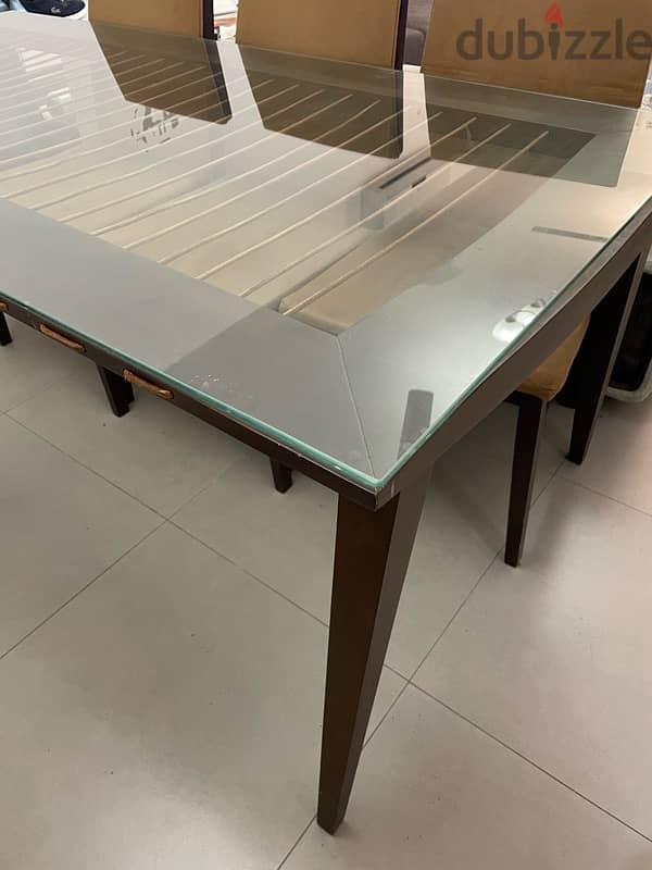 Dining table with glass top - OMR 25 1