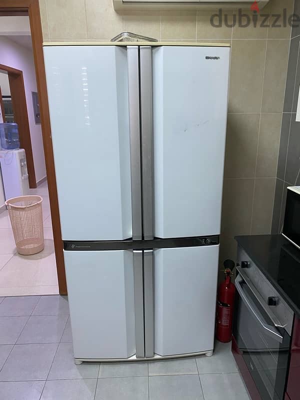 sharp plasma cluster fridge with freezer 1