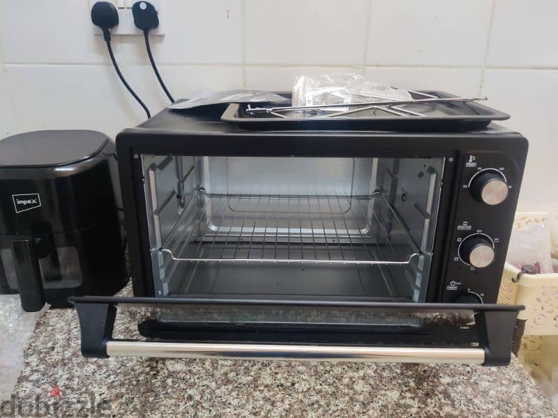 OTG oven with little body dent brand new 1