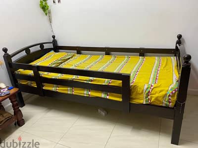 Wooden Bunk Bed - HomeCentre (Bed: Cream sheet below, yellow top)