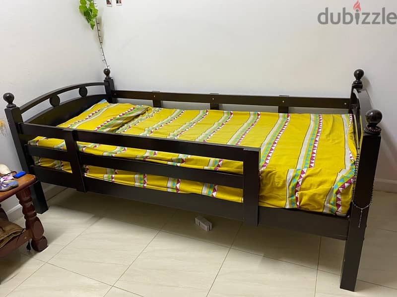 Wooden Bunk Bed - HomeCentre (Bed: Cream sheet below, yellow top) 1