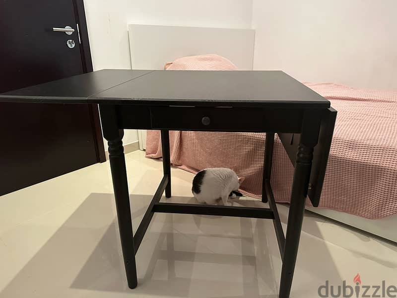 Dark brown IKEA foldable writing table 10