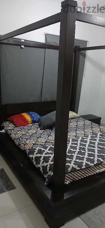 bed set and LCD tv