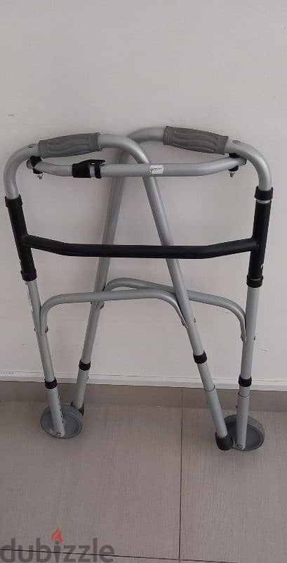 BRAND NEW, NEVER USED, WALKING AID 3