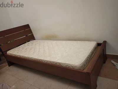 Twin XL size mattress with wooden cot