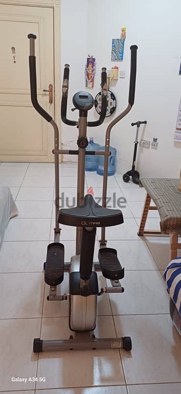 OLYMPIA MAGNETIC ELIPTICAL TRAINER WITH GOOD CONDITION