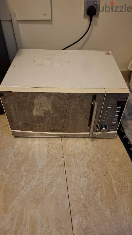 microwave and water dispenser very cheap price both items 1