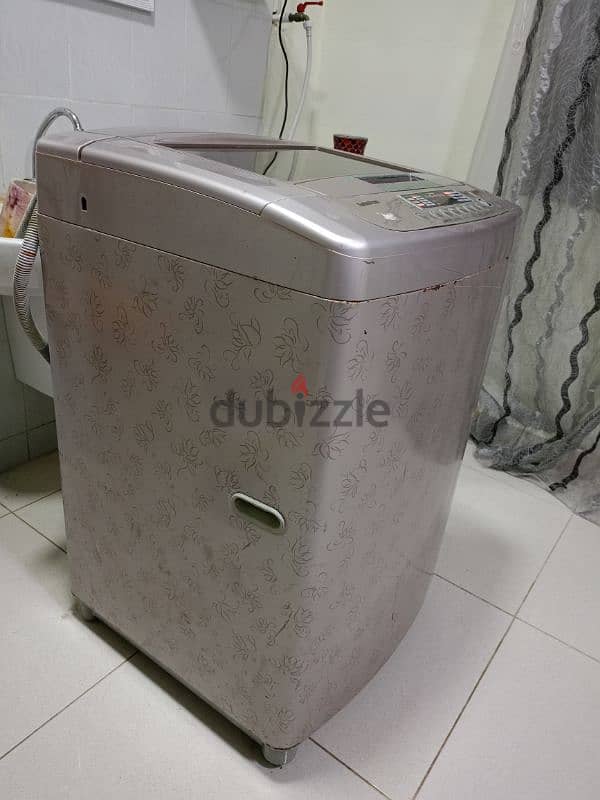 15 kg LG fuzzy Logic washing machine for sale in Awqad Salalah 1