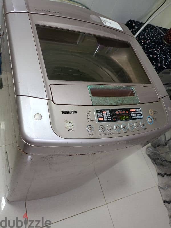 15 kg LG fuzzy Logic washing machine for sale in Awqad Salalah 2