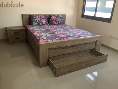 King Side Bed + Side Table with 2 Drawers + 8" Mattress like new.