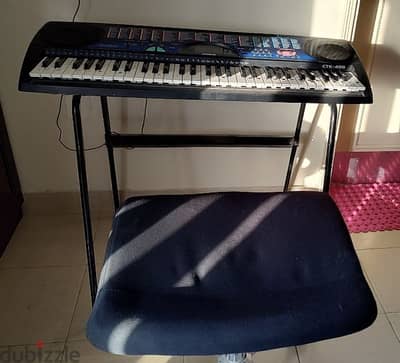 Casio CTK 495 keyboard with the stand and seat