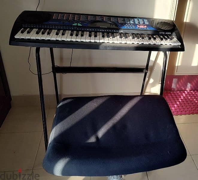 Casio CTK 495 keyboard with the stand and seat 0