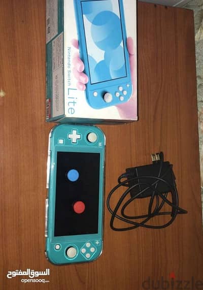 Nintendo switch lite ocean  blue with box and original charger and