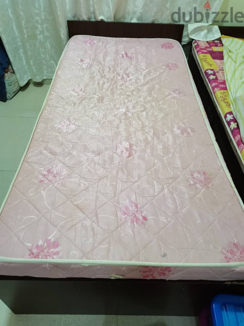 Used single wooden bed with medical mattress 2