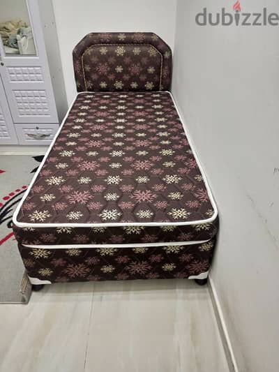 Single bed with mattress and 2 door cupboard