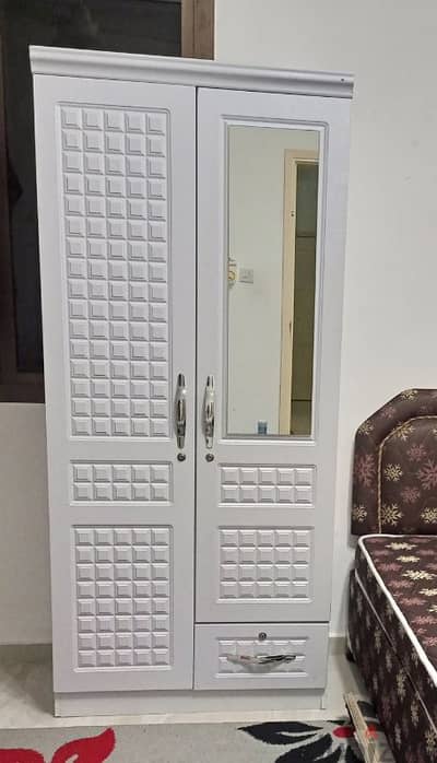 Single bed with mattress and 2 door cupboard