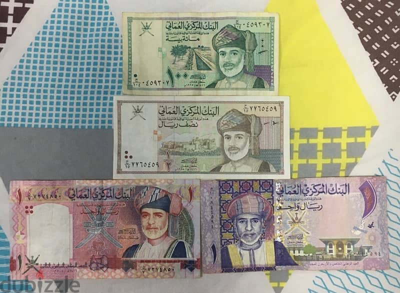 a set of 4 old Omani banknotes 0