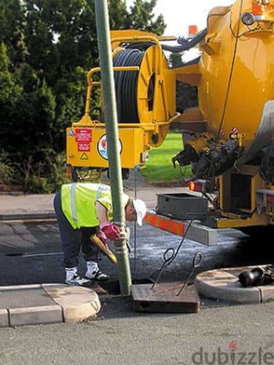 cleaning septic tank remove block pipe open