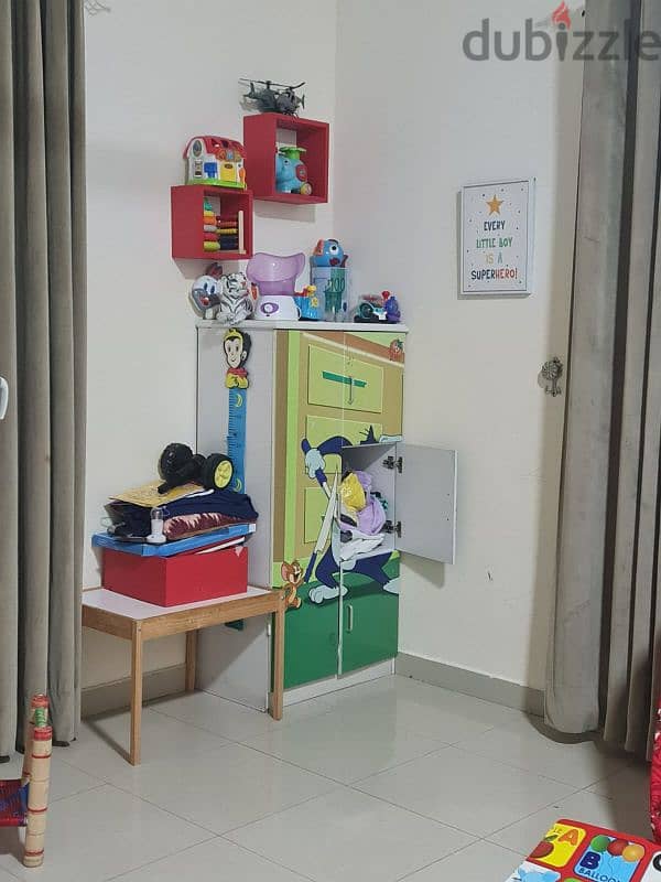 Kids cupboard and two door cupboard. table and chair 9