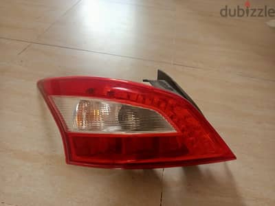 Maxima left rear light