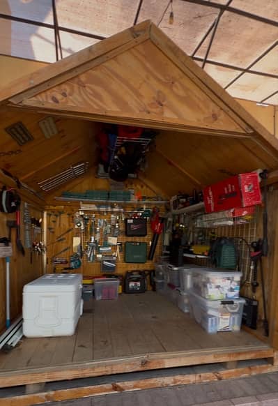 Two Wooden Storages Equipped with Tools and machines