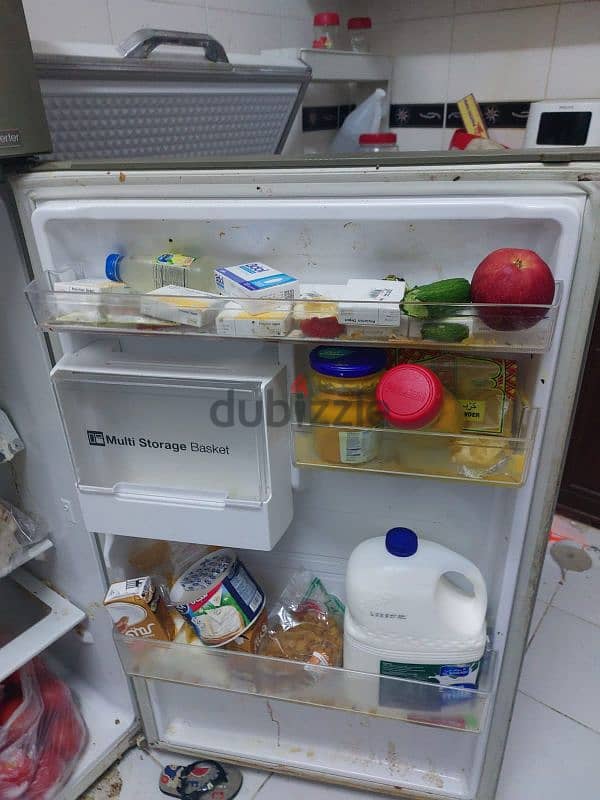 good condition fridge full working check 100 family used 2