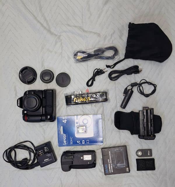 Nikon D3000 للبيع 0